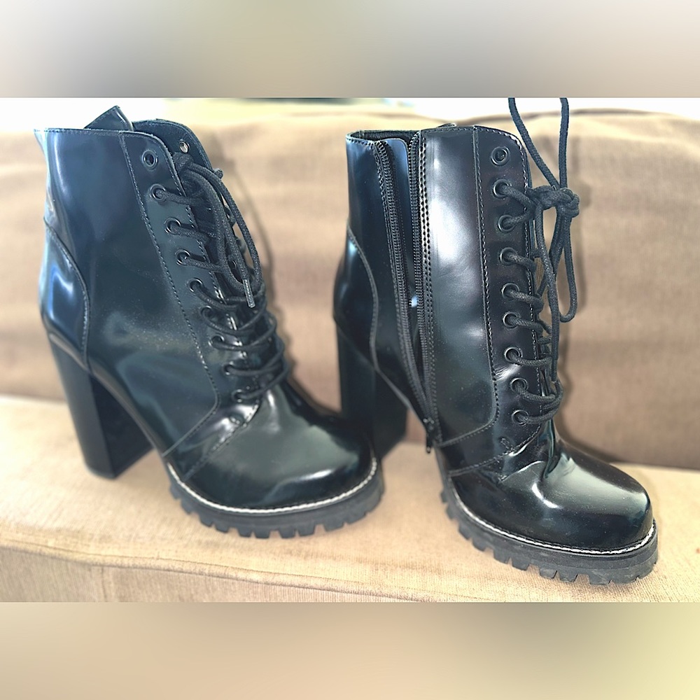 Jefferey Campbell high heeled lug sole ankle boots.